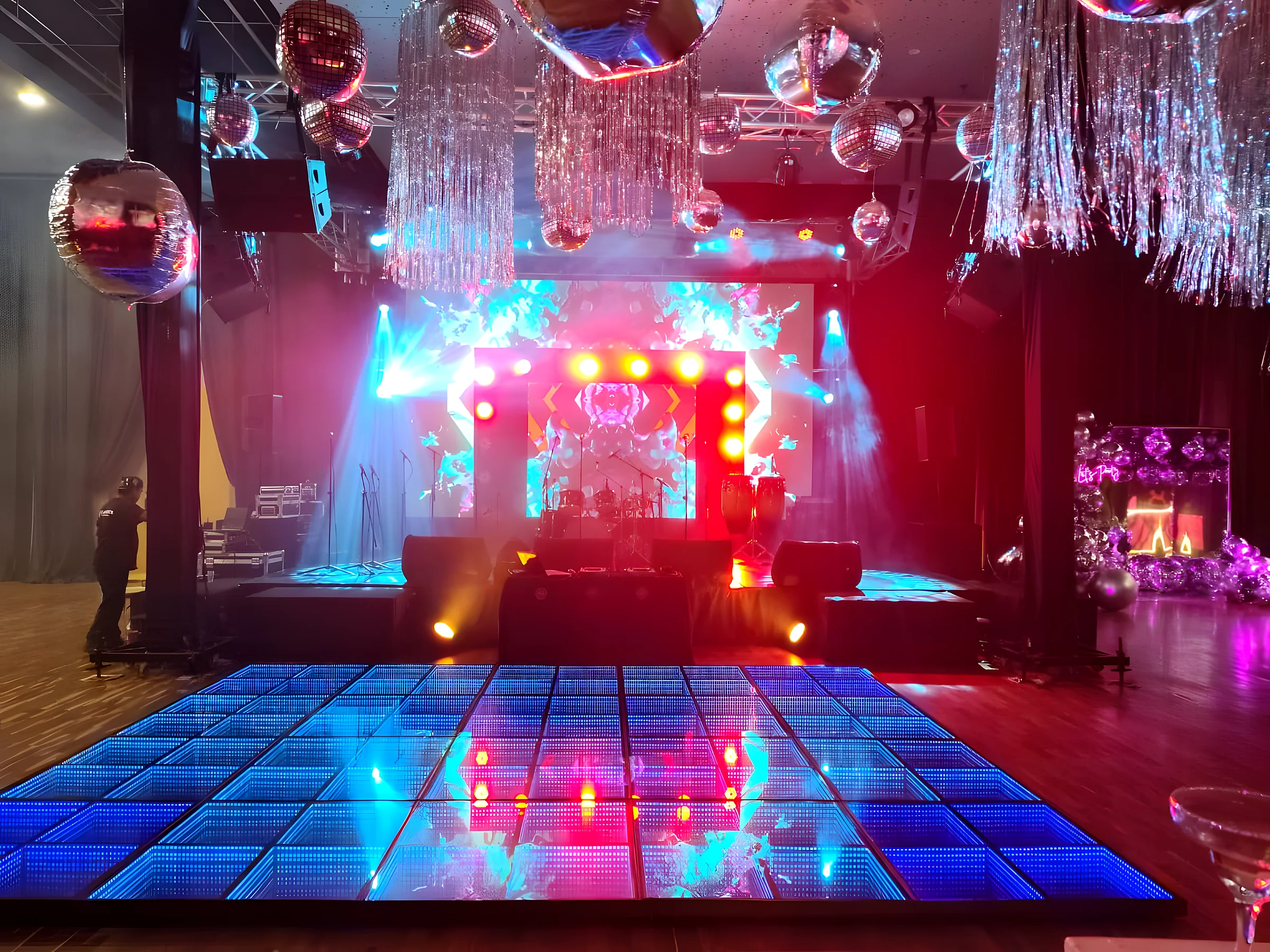 Boda con pista LED y luces magenta